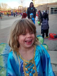 Happy Phoebe in line to go in to first grade.